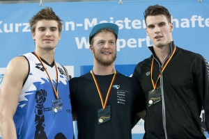Finale DKM Siegerehrung 100m Schmetterling Männer. *** Marius Kusch; Steffen Deibler; Philipp Wolf